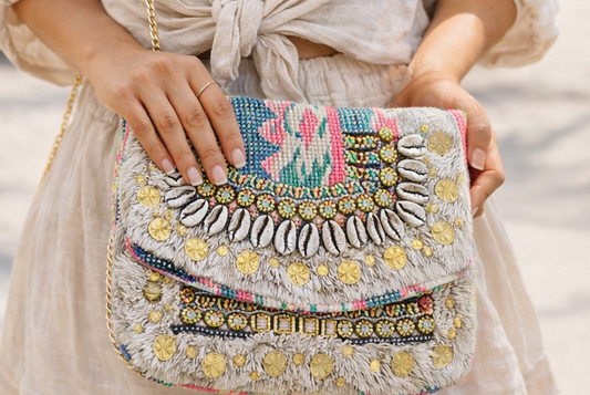 Fabric bag with decorative embellishments