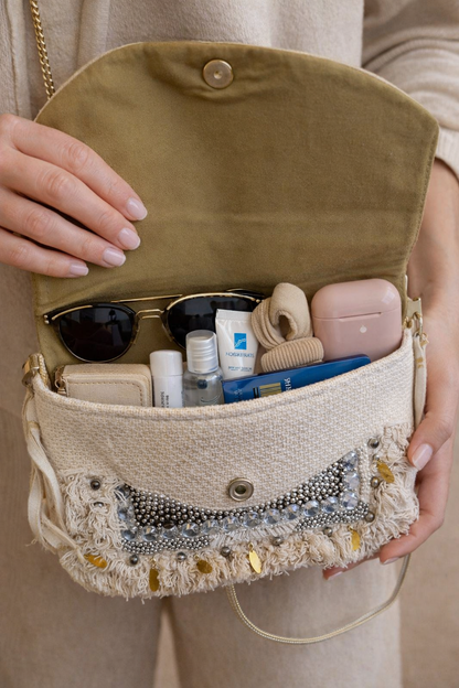 Interior view of boho clutch with lining and magnetic closure