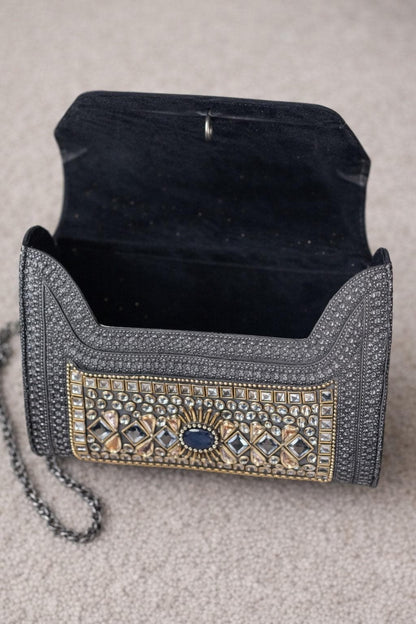 oxidised and studded metal sling bag